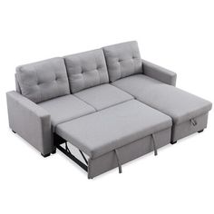 a grey couch with two recliners sitting on it's side and one arm extended