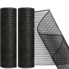 two rolls of black mesh sitting next to each other