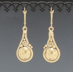 ER725- 14k Yellow gold Unique Domed Earrings with no stone. They come with Lever back ear wires for safety. Earrings Measure 12 mm Wide x 26 mm Long. Total Length with ear wires are 1 1/2". Nice casual everyday earrings. These earrings are made with the Lost Wax Casting Process where I make the design in wax and then cast it into gold. Thanks for looking if you have any questions please feel free to contact me. Patti Yellow Gold Oval Earrings With French Hook, Elegant Brass Earrings With Lever Back, 14k Gold French Hook Earrings For Anniversary, Elegant Brass Lever Back Earrings, 14k Gold Teardrop French Hook Earrings, 14k Gold Teardrop Earrings With French Hook, 14k Gold Lever Back Earrings, Gold Lever Back Earrings, Sterling Silver Yellow Gold French Hook Earrings