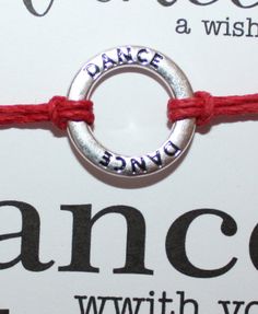 15 DANCE WISH Bracelets Great for Gifts, Team Spirit, Coach Gifts, Birthday Favors Can also be used as Friendship Bracelets A round infinity affirmation charm reads DANCE in the round and is knotted and tied at center Bracelet ties on and is adjustable - Just knot and cut cord to desired length Assorted hemp cord colors - Please the color that fits! Refer to the last picture Bracelet is tied to a card that reads: DANCE A Wish Bracelet DANCE With Your Heart Your feet will follow. Wrap this bracel Flexible Red Jewelry For Gift, Adjustable Jewelry For Valentine's Day Celebration, Silver Adjustable Jewelry For Dance, Spirit Birthday, Picture Bracelet, Dance With You, Hemp Cord, Wish Bracelets, Coach Gifts