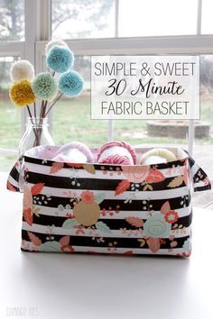 an image of a bag with yarn balls in it and the words simple & sweet 30 minute fabric basket