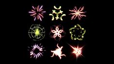 fireworks are lit up in the dark with different shapes and sizes on it's side