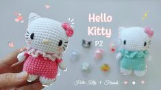 a crocheted hello kitty doll is shown in front of some tiny pins and magnets