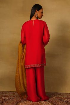 Red straight kurta with floral embroidery using thread work, dabka, bullion and coins. Paired with a flared pant and cutwork trimmed ochre dupatta. - Aza Fashions Elegant Red Unstitched Suit With Intricate Embroidery, Red Designer Unstitched Georgette Suit, Elegant Red Georgette Unstitched Suit, Red Semi-stitched Set With Floral Embroidery, Red Georgette Sharara With Floral Embroidery, Red Georgette Sharara With Chikankari Embroidery, Elegant Red Unstitched Suit With Floral Embroidery, Red Georgette Sets With Chikankari Embroidery, Red Chikankari Embroidered Sharara In Georgette