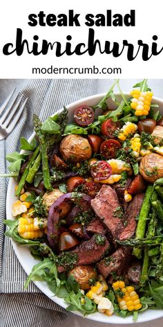 steak salad with tomatoes, corn and broccoli in a white bowl on a table