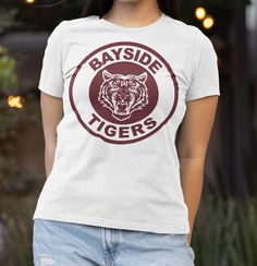 Go Bayside!! Rep your favorite fictional high school with this amazing t-shirt! White T-shirt With University Logo For Fans, White Band Merch T-shirt For College, University Logo T-shirt For Streetwear, Saved By The Bell, Favorite Things Gift, Tigers, Gender Neutral, High School, Graphic Tees