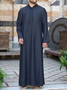 Full length Hood with drawstring ties Buttoned neck opening Side slit pockets Model is 184cm (6 feet) and wearing size L Item Code: mG6103 Thobes Men, Light Peach, Extra Fabric, Comfortable Dress, Body Size, Different Fabrics, Black Media, Full Length, Lifestyle