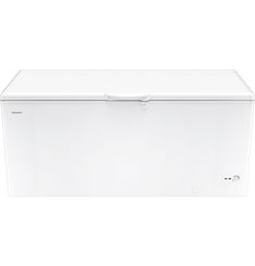 a white chest freezer sitting on top of a table