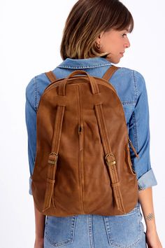 Our convertible backpack is a perfect example of how flawlessly to combine form and function. For comfort and ease, the bag can serve you as your everyday backpack or as an everyday tote bag, and it can store all of your worthwhile belongings such as your laptop, iPad, and wallet. The bag has a classic elegant look and will complement your sophisticated everyday look. #Backpack #LeatherBackpack #TravelBag #Travel #SchoolBag #MinimalistDesign #Minimalist #Classic #WanderLust #LuxuryBag #Design Versatile Brown Leather Backpack With Zipper, Versatile Brown Leather Backpack, Versatile Leather Backpack, Versatile Brown Leather Backpack For Daily Use, Leather Softback Backpack With Zipper Closure, Versatile Brown Leather Satchel Backpack, Leather-backed Satchel Backpack For Everyday Use, Leather Satchel Backpack For Everyday Use, Versatile Leather Backpack For Everyday