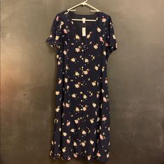 Size 14 Midi Dress From Gap. Navy With Pink And White Flowers. Spring Midi Dress By Gap, Gap Midi Beach Dress, Gap Spring Midi Maxi Dress, Gap Spring Midi Length Maxi Dress, Gap Spring Midi Dress With Short Sleeves, Gap Midi Length Maxi Dress For Spring, Gap Short Sleeve Midi Dress For Spring, Casual Short Sleeve Midi Dress By Gap, Casual Knee-length Dress By Gap