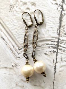 Art Nouveau Large Freshwater Pearl Drop Dangle Long Earrings Antique Dangle Pearl Drop Earrings, Antique Style Dangle Pearl Drop Earrings, Antique Pearl Drop Dangle Earrings, Vintage Brass Pearl Drop Earrings, Elegant Antique Gold Earrings With Lever Back Ear Wires, Vintage Teardrop Pearl Earrings, Vintage Dangle Pearl Earrings With Ear Wire, Vintage Handmade Teardrop Pearl Earrings, Gold Vintage Pearl Earrings Nickel Free