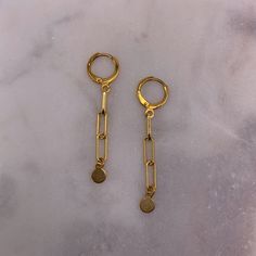 Materials: Gold-plated lever back earrings, gold-filled paperclip chain + charm.  Sizing + Fit: This earring is meant to hug the earlobe. Trombone, Huggie Earrings, Chain Earrings, Huggies Earrings, Paper Clip, Earrings Gold, Jewelry Earrings Dangle, Gold Filled, Etsy Earrings