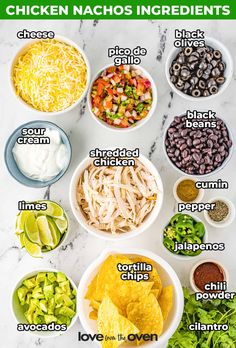 the ingredients for chicken nachos in bowls on a marble counter top with text overlay