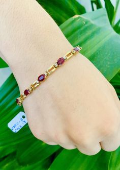 Stunning Vintage 14K Yellow Gold Diamond Ruby Bracelet: Stunning Genuine Diamonds and Natural Ruby 11 pc oval shape 6x4mm Ruby(s): 7.50CT Diamond(s): 0.28CT Color: G Clarity: SI2 Total Bracelet Weight: 11.0GR Bracelet Length: 7in Bracelet Width: 1/2cm 14K Yellow Gold For more information regarding this item feel free to reach me so I can accommodate your needs. Thank you Mens Diamond Wedding Bands, Ruby Bracelet, Rings Mens Wedding Bands, Ruby Diamond Rings, Emerald Diamond Ring, Engagement Ring Diamond Cut, Oval Cut Diamond, Natural Ruby, Emerald Diamond