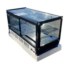 A beautiful refrigerated bakery case that will be the most adaptable to your work enviorment while providing a excellent view of all your products that you have to offer in your location. Cooler Depot | Cooler Depot 7 cu.ft. Refrigerated Display Case 29.0 H x 48.0 W x 22.0 D in / gray / white in Black | 7 cubic feet | Wayfair Bakery Display Case, Commercial Refrigerators, Bakery Items, Bakery Display, Condiment Holder, Christmas Storage, Shelf Organization, Curtain Accessories, Display Case