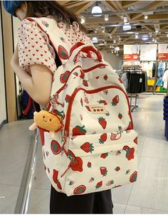 Get ready to strawberry your stuff with our White and Red Strawberry Print Backpack! This cute kawaii backpack adds a playful touch to your everyday carry while keeping your essentials organized. Perfect for anyone who loves a pop of red and some fruity fun in their life. Main Material: Nylon Lining Material: Polyester Bag Size: 31 * 14 * 44cm Keychain not included Graffiti School, Japanese School Bag, Japanese Student, Kawaii Backpack, Cute Backpack, Denim Backpack, Dumpling Bag, Pearl Bag, Red Strawberry