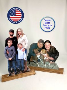 the family is posing for a photo with their dog and baby in front of an american flag background