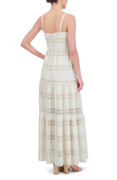 A modern maxi dress sweetens the already dreamy deal with lilts of lace and slender straps. 49" center front length (size 8) Hidden back-zip closure V-neck Adjustable straps Partially lined 98% polyester, 2% spandex Dry clean or hand wash, dry flat Imported Beige Lace Floor-length Maxi Dress, Lace Maxi Dress With Spaghetti Straps For Wedding, Summer Floor-length Maxi Dress With Delicate Lace, Sleeveless Summer Maxi Dress With Delicate Lace, Floor-length Maxi Dress With Delicate Lace For Spring, Cream Lace Sleeveless Maxi Dress, White Delicate Lace Maxi Dress, Delicate Lace Floor-length Maxi Dress For Spring, Fitted Maxi Dress With Delicate Straps