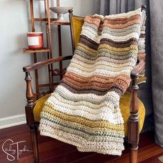 striped chunk crochet blanket draped on a chair Bernat Blanket Patterns, Chunky Crochet Throw, Chunky Blanket Pattern, Chevron Crochet Blanket Pattern, Foundation Half Double Crochet, Chunky Crochet Blanket Pattern, Crochet Waffle Stitch, Crochet Throw Pattern, Throw Blanket Pattern