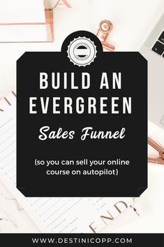 the words build an evergreen sales funnel on top of a desk with laptop and papers