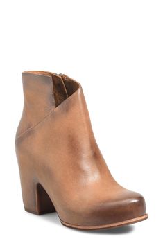 An asymmetric topline adds visual intrigue to a rich leather bootie lifted by a hidden platform and block heel. 3 1/2" heel 4" shaft Side zip closure Cushioned footbed Leather upper and lining/rubber sole Imported Leather Platform Boots With 4-inch Heel, Chic High Heel Wedge Boots With Reinforced Heel, Leather Platform Boots With Wedge Heel For Fall, Brown Pointed Toe Platform Boots With Stacked Heel, Calf Leather Heeled Boots With Heel Pull Tab, Calf Leather High Heeled Boots With Stacked Heel, Brown High Heeled Boots With Deep Heel Cup, Fall Leather Platform Boots With Sculpted Heel, Leather Wedge Boots With Block Heel For Fall