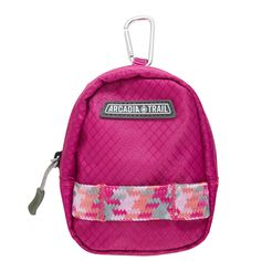 a small pink backpack with a zipper on the side and a white handle attached to it