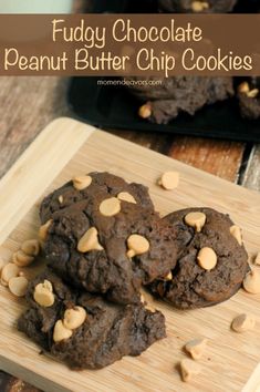 chocolate peanut butter chip cookies on a cutting board with the words fudy chocolate peanut butter chip cookies