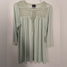 Light Green Long Sleeves Woman Blouse, Lace In The Front And Back With Split All Around To Give A Elegant Style. Half Quarter Sleeves With Lace In The End Of It. . Casual Stretch Blouse With Lace Trim, Flowy Casual Blouse For Daywear, Casual Tops With Lace Trim And 3/4 Sleeve, Casual Tunic Blouse For Brunch, Casual Tunic Tops For Brunch, Casual Lace Trim Blouse For Day Out, White Tunic Blouse, Sleeves With Lace, Woman Blouse