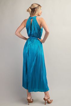 HALTER NECK PLEATED DRESS Features: High neck Front and back cutout details Pleated design Maxi length Fabric: 100% Polyester GD6318 Baby Clothes Sale, Main Event, Curvy Jeans, Pleated Maxi Dress, Pleated Maxi, Capri Blue, Curvy Dress, Clothes Collection, Pleated Dress