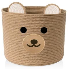 a toy basket with a bear's face on the front and bottom, made out of jute