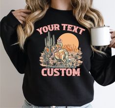 "How to order 1) Choose sweatshirt or hoodie size  2) Choose sweatshirt or hoodie color  3) Select design color if applicable 4) For personalized designs - enter customization in \"Add your personalization\" field 5) Select the \"Quantity\". 6) Click \"ADD TO CART\". If you want additional items (to avoid paying for multiple shipping), go back to our shop and repeat the above steps. Sweatshirt 8 oz./yd² (US) 13.3 oz./L yd (CA), 50/50 cotton/polyester, 20 singles Heather Sport colors: 60/40 polye Customizable Long Sleeve Fan Apparel Sweatshirt, Fan Apparel Long Sleeve Sweatshirt With Custom Print, Long Sleeve Sweatshirt With Custom Print For Fans, Customized Long Sleeve Sweatshirt With Graphic Print, Bachelorette Party Western, Western Sweatshirts, Sorority Sweatshirts, Custom Sweaters, Colorful Hoodies