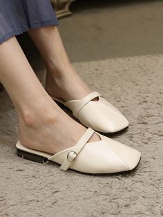 Editor's NotesLifla's mules are designed for modern and classy looks. Its design and luxurious leather is perfect for daily wear.- Trendy round toe design- Feminine and natural moods- Easy slip-on mules style with buckle- Inner cushioned patch with logo for non-slip- Light-weightedMeasurements(in.)- Size: KR 225mm (US 5.5) - KR 250mm (US 8) - Heels: Height 0.79in.- Fits true to the sizeComposition & Care- Artificial leather- Do not wash- Avoid heat and moisture- Professional shoe cleani Classy Looks, Professional Shoes, Toes Designs, Slip On Mules, Clean Shoes, Artificial Leather, Toe Designs, How To Look Classy, Men Shoes Size