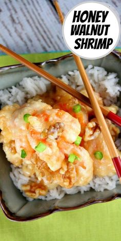 a plate with rice, shrimp and chopsticks on it that says honey walnut shrimp