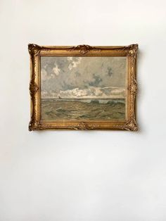 an old painting hanging on the wall