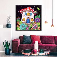 a living room with a red couch and a mushroom house on the wall above it