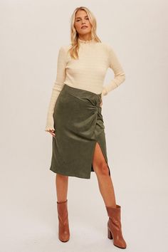 Twist detailed suede midi skirt. 100% Polyester Runs true to size. Model is wearing a small (32” bust, 26” waist, 35” hips, 5’2”) Waist Hips Length Small 28 inches 36 inches 25.5 inches Medium 30 inches 38 inches 26 inches Large 32 inches 40 inches 27 inches We measure each item from side seam to side seam, on a flat surface. Please consider the fabric content of each item, as fabric containing stretch may have give. Suede Midi Skirt, Midi Skirt Fall, Modern Western, Boho Fashion Bohemian, Mixed Emotions, Suede Skirt, Wear To Work, Weekend Wear, Hip Length