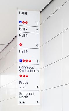 an airport sign is hanging on the wall