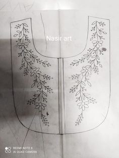 the back side of a sewing pattern with leaves on it