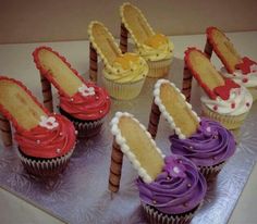 cupcakes with different colored frosting and designs on them