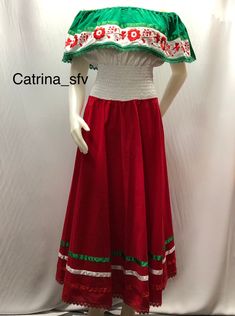 Mexican red white dress embroidered with red flowers and white and green slats the dress is unitalla fits from small to large size