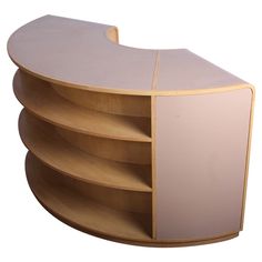 the curved counter is made out of wood and has three sections on each side, one section