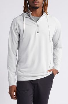 Stay comfortable on and off the course in this lightweight pullover featuring an adjustable drawstring hood and durable performance fabric. 27" length (size medium) Half-zip closure Drawstring hood; inner stand collar Long sleeves 88% polyester, 12% spandex Machine wash, tumble dry Imported Sporty Half-zip Hoodie For Outdoor, Athleisure Half-zip Hoodie For Outdoor, Functional Half-zip Hoodie With Drawstring Hood, Casual Gray Half-zip Hoodie, Casual Half-zip Hoodie For Gym, Casual Half-zip Gym Hoodie, Half-zip Hoodie For Outdoor Activities, White Half-zip Casual Hoodie, Functional Half-zip Hoodie For Outdoor Activities