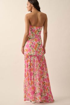 Floral-print chiffon maxi dress. Strapless straight neckline. Sleeveless. Drop-waist design. Asymmetrical skirt. Side slit. Low back. Invisible zipper side closure. Partial lining. Ankle length. Fit-and-flare silhouette. 100% Polyester. Imported. Designed in LA. Model wears size S. Mini Graduation Dress, Summer Dresses Long, Maxi Summer Dress, Asymmetrical Maxi Dress, Strapless Summer Dress, Colorful Dress, Maxi Dress Pattern, Straight Neckline, Strapless Maxi Dress