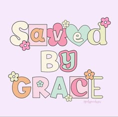 the words saved by grace are painted in pastel pink, green and yellow colors