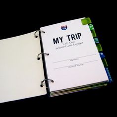 a notebook with the words my trip written on it