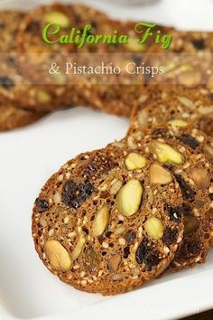 cookies with nuts and raisins on a white plate