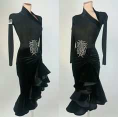 the dress is black and has silver details on it