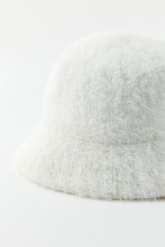 Seriously soft bucket hat in an ombre dye with a fuzzy finish. Features Ombre fuzzy bucket hat Fuzzy bucket hat Ombre dye finish Content + Care 75% Nylon, 25% polyester Spot clean Imported Size Circumference: 22" | Ombre Fuzzy Bucket Hat in Ivory, Women's at Urban Outfitters Trendy White Winter Bucket Hat, White Short Brim Bucket Hat For Winter, White Winter Bucket Hat With Short Brim, White Brimmed Bucket Hat For Winter, Fluffy White Winter Hat, Spring Hats From Urban Outfitters, White Fluffy Winter Hat, White Curved Brim Bucket Hat For Winter, White Soft Winter Hat