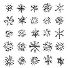 a collection of snowflakes drawn by hand in black ink on a white background