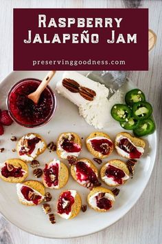 raspberry jalapeno jam on a plate with crackers and cheese